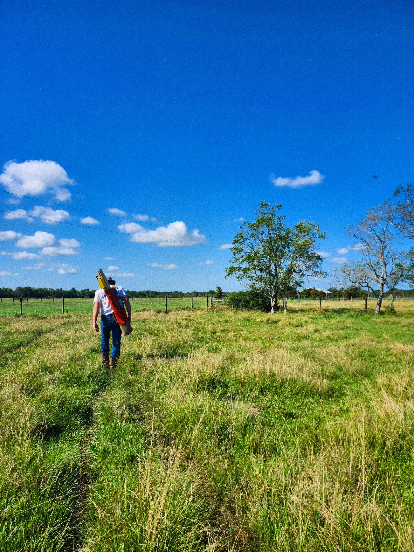 Land surveyor working in Southeast Texas field